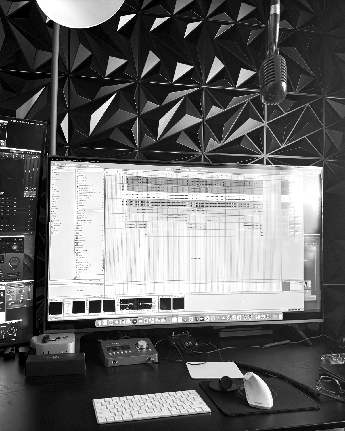 GR8's studio — mic, monitors and the session on screen